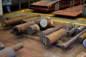 round hot rolled steel billets in a warehouse